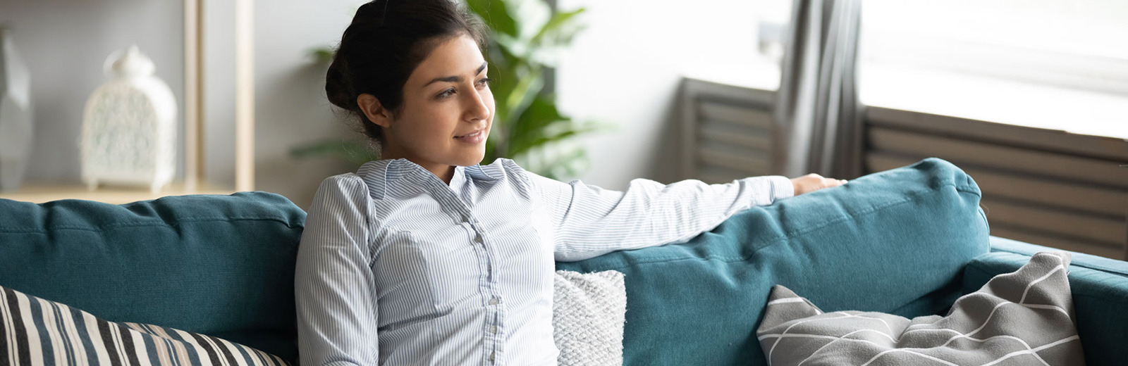 Tenant sitting on couch